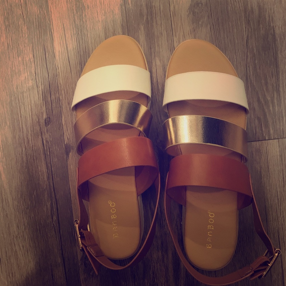 Cute never worn sandals.  Needed a different size